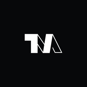  Minimal elegant monogram art logo. Outstanding professional trendy awesome artistic TM MT initial based Alphabet icon logo. Premium Business logo White color on black background
