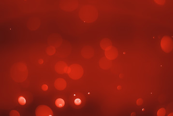 Ruby red bokeh background with soft blur bokeh light effect, background bokeh