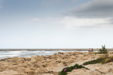 Beach under stormy sky La Almadraba beach Denia Spain