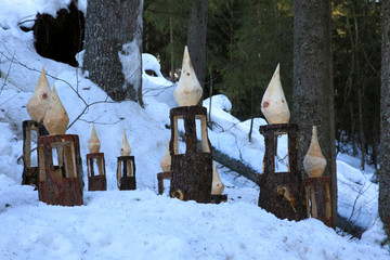 Carezza Lake (BZ), Italy - December 01, 2019: The wooden sculpture at Carezza Lake, Nova Levante,...