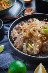 Asian Cuisine, Spicy Asian Beef Noodles, Pho Bo and seafood rice on dark background