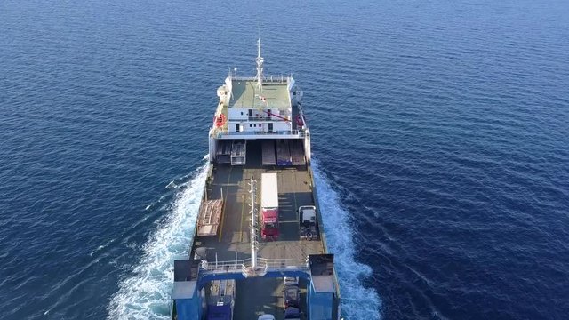 Ro Ro Ship: Aerial view of a medium RoRo Vehicle carrie vessel cruising at sea.