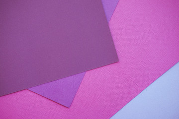 Abstraction of a design pink paper. Empty space on monochrome paper.