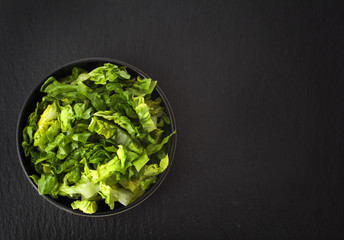 Shredded lettuce in a bowl
