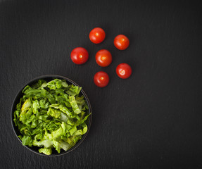 Shredded lettuce and cherry tomatoes