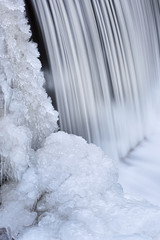 Winter landscape of a cascade on Bear Creek, captured with motion blur, Front Range, Rocky Mountains, Colorado, USA