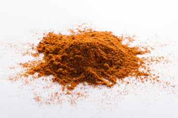 Closeup of heap red hot pepper on the white background