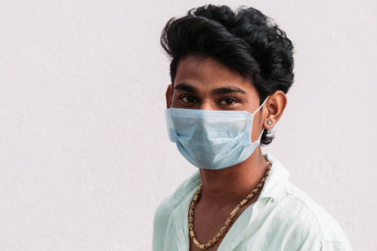 Young Indian Man Wearing Mask To Prevent Himself From Getting Infection From Corona Virus Pandemic