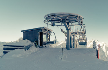 St. Anton, Austria - January 8, 2019 - two-seater ski lift in snowy weather