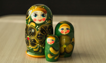 three nesting dolls on the table