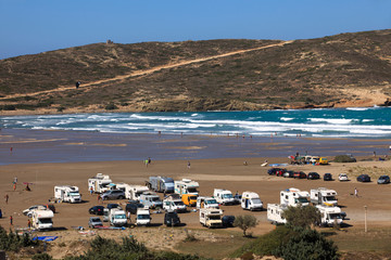Prasonissi, Rhodes / Greece - June 23, 2014: Campers at Cape of Akra Prasonisi, Rhodes, Dodecanese Islands, Greece.