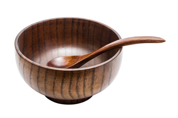 Cedar wood bowl with a spoon on a white background isolated