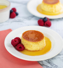 Yummy Honey Flan Topped with Raspberries