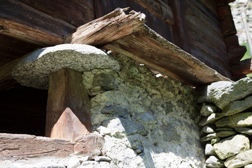 Fototapeta premium Ponte (VCO), Italy - March 06, 2017: A particular of a typical Walser house, Formazza Valley, Ossola Valley, VCO, Piedmont, Italy