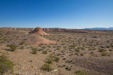 Fototapeta na wymiar American Wild West Landscape. Desert mountain landscape with large butte and mountain range in the American Southwest desert of Arizona. 