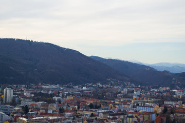 Fototapeta na wymiar Austria, Graz, mountain landscape and city.