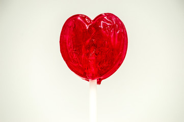 Heart shaped red lollipop