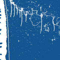 Creative abstract background. White splashes of paint on a blue background. Trend of the year 2020 classic blue.