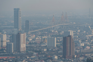 Fototapeta na wymiar A lot of dust(PM 2.5) in the environment of Capital city from above, BANGKOK, Thailand