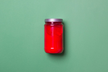 red bank with powder on green colored paper background