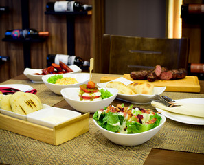 green capresse salads wine and cheese