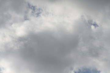 Sky with clouds seen against the sun