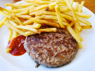 juicy steak beef meat with tomato and french fries
