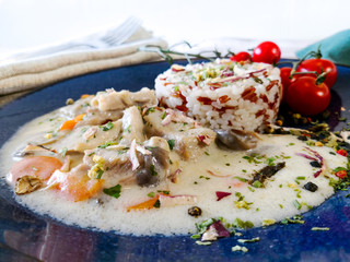 risotto with fresh cream, salted chicken, rehydrated ceps and mushrooms