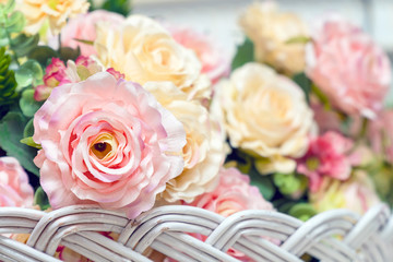 Bouquet of artificial pink roses close-up. Selective focus