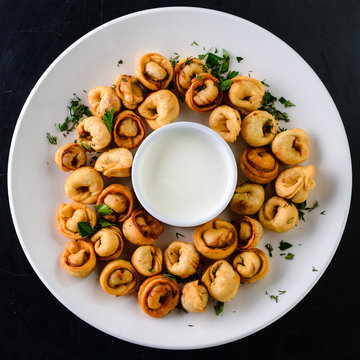 small dumplings with sour cream