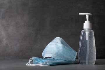 Sanitizer gel or antibacterial soap and face mask for coronavirus preventive measure - obrazy, fototapety, plakaty