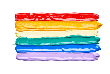 Texture and strokes of multicolored acrylic paint with sparkles on a white background