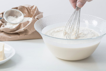 dough in glass plate and products for its preparation on  white