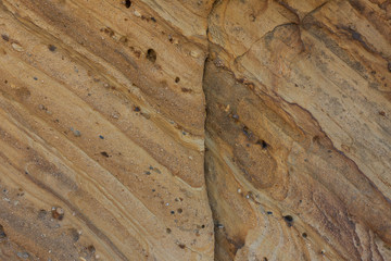 Details on schist rocks at Praia de Santa Cruz beach, in Portugal