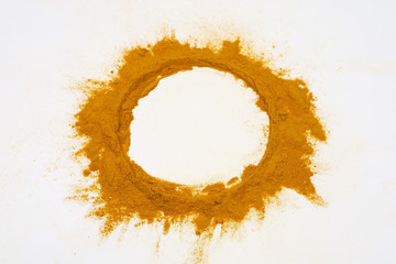 Turmeric powder, isolated on a white background, is an ingredient in turmeric foods and ingredients in skin care products. Turmeric helps the skin to be strong.