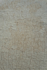 Small cracks on the wall. Grunge background. Smears, stains. Macro