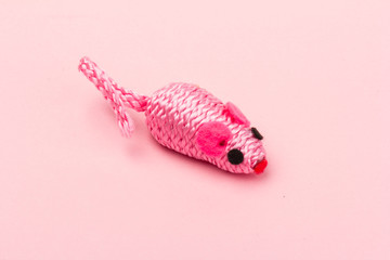 rose toy mouse for pet isolated on rose background