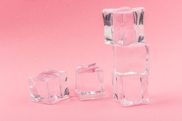 ice cubes close up on rose background