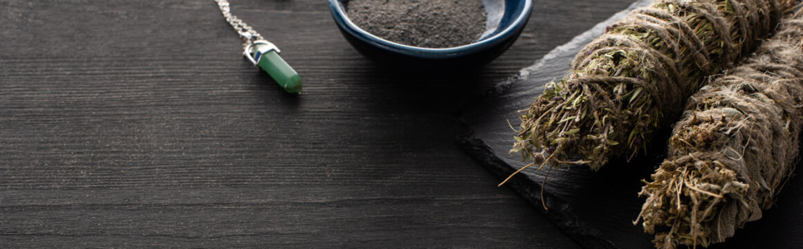 Close Up View Of Smudge Sticks, Bowl With Ash And Magic Crystal On Dark Wooden Background