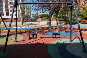Obraz premium closed and empty children playgrounds in Spain because of coronavirus, covid-19, crisis