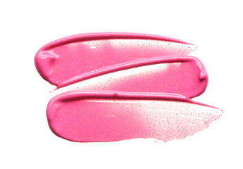 Gently pink strokes and texture of lip gloss or acrylic paint isolated on white background