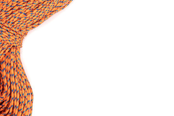 coil of orange rope used for sailing