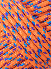 coil of orange rope used for sailing