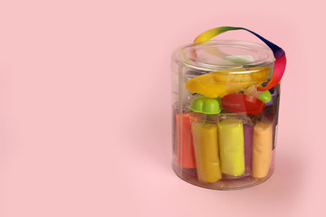 colorful clay, plasticine with tools in the package