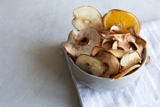 Fruit chips on a striped napkin apple snacks and pear chips