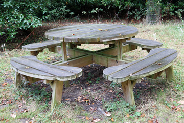 Round wooden picnic table