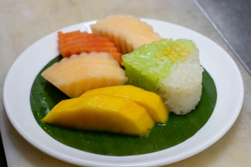  fresh mixed fruit on white plate