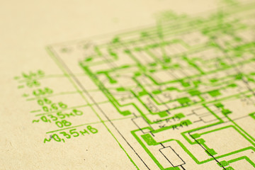 Electric radio scheme printed on old vintage paper electricity diagram as background for education, electricity industries,  repair etc. Selective focus with depth of field.