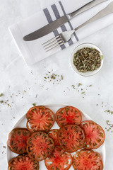 Fresh tomato carpaccio with olive oil