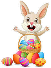 Cartoon rabbit with easter eggs in basket . Vector illustration